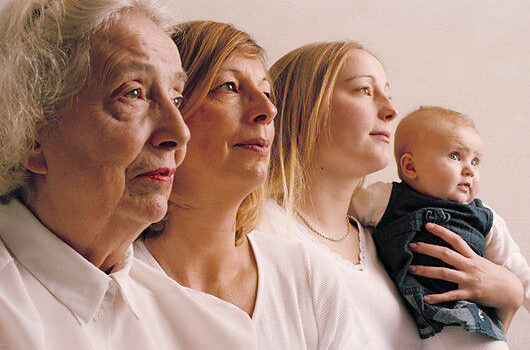 MODEL RELEASED. Family.  Profile of four female generations of a family, from the great- grandmother at far left to great-granddaughter at far right.